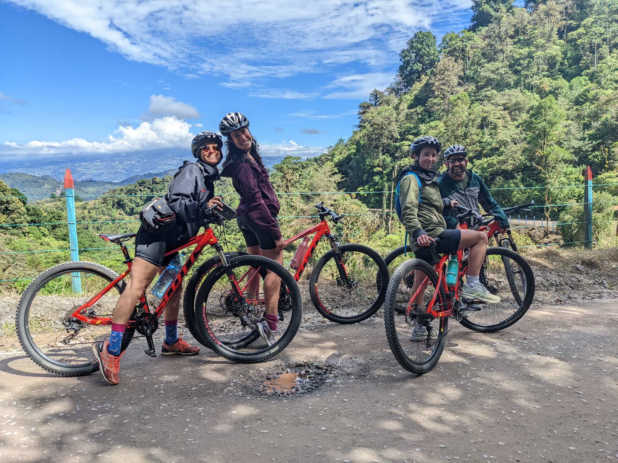 Group cyclist stopping at view point, Costa Rica
