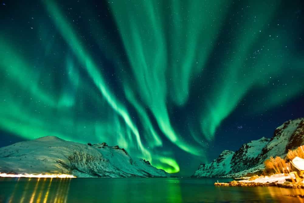 Lighting up Tromso, Norway. Photo: iStock / MuYeeTing