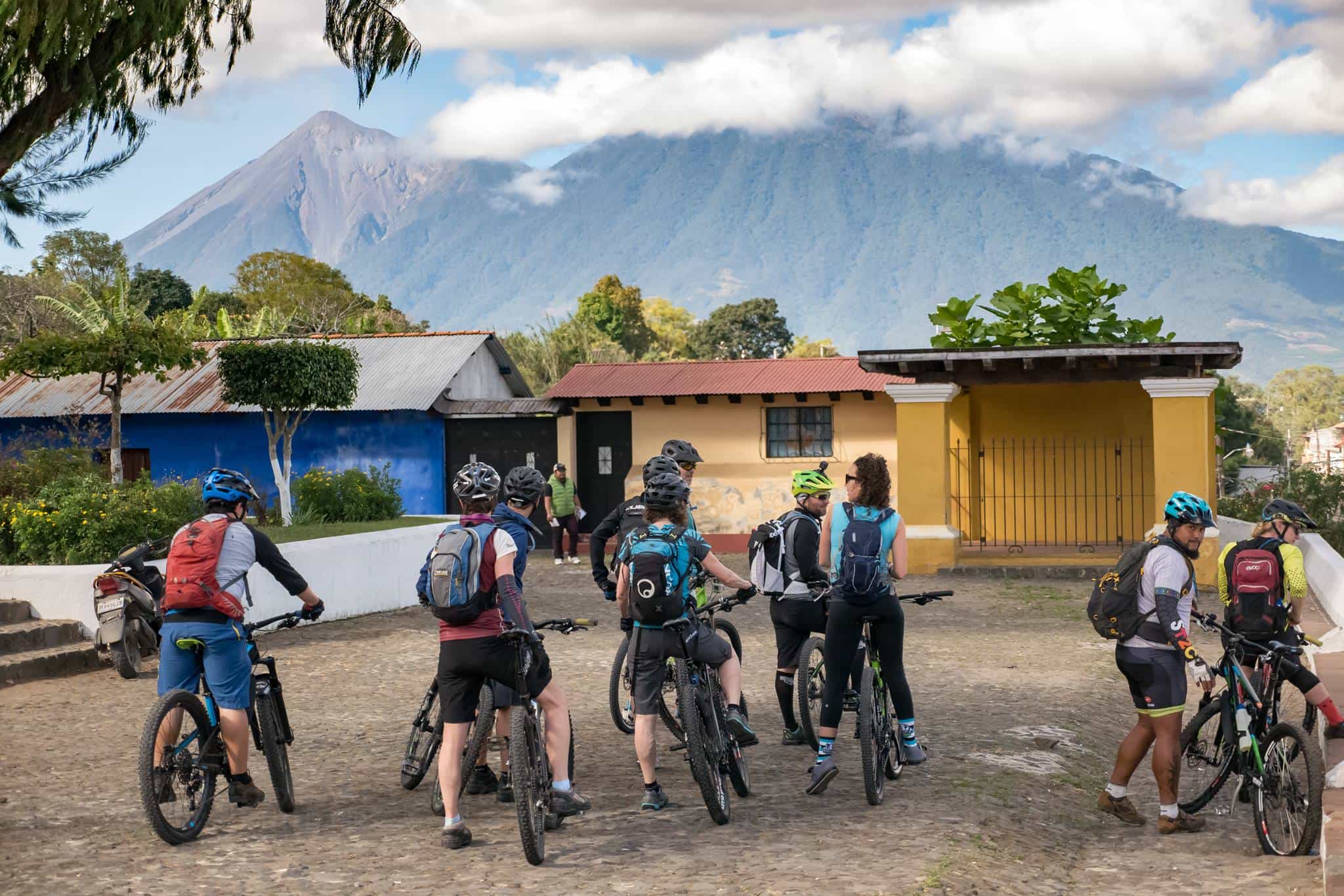 Group of cyclists in the Antigua valley, Guatemala.