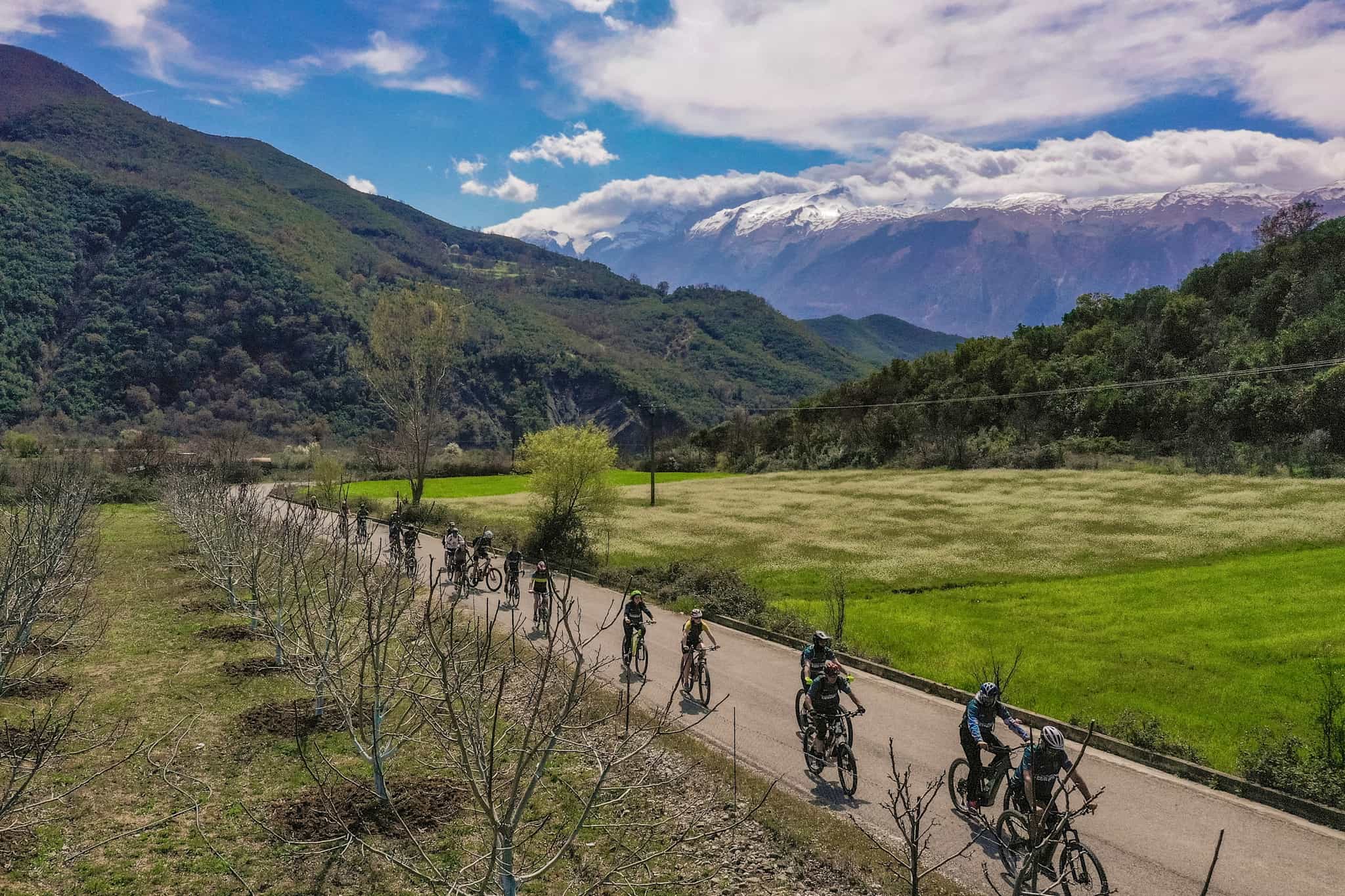 Group cycling the countryside near Permet, Albania.