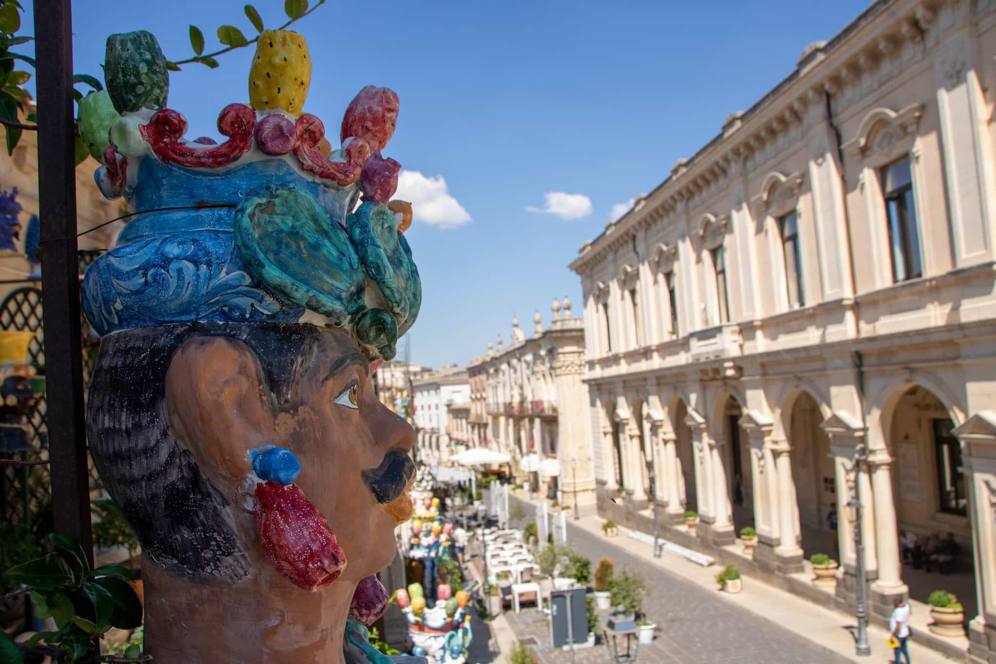 Traditional ceramic Moor head on a baroque balcony, Palazzolo Acreide, Sicily