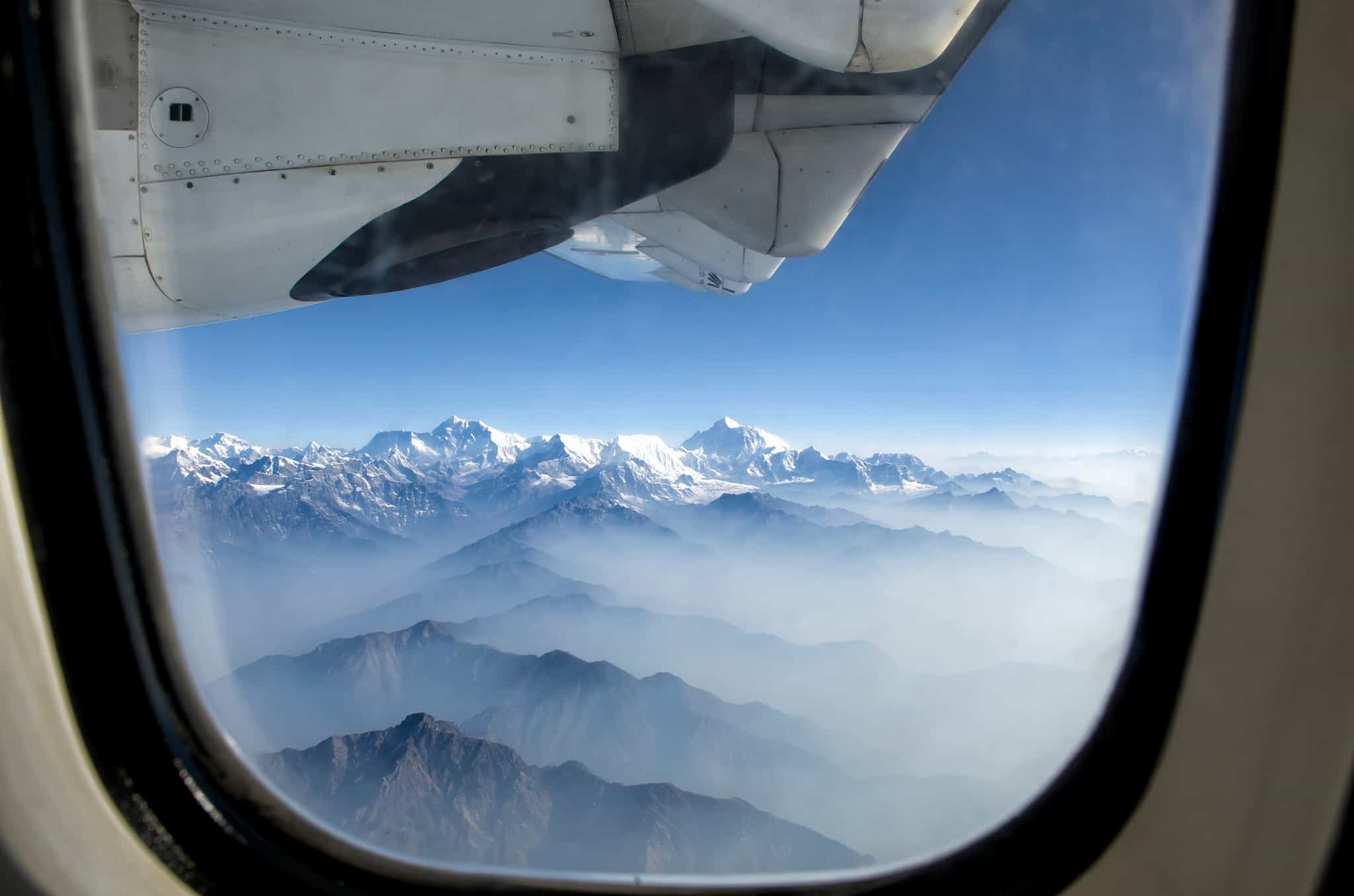 Looking over the Himalayas through a plane window over Bhutan