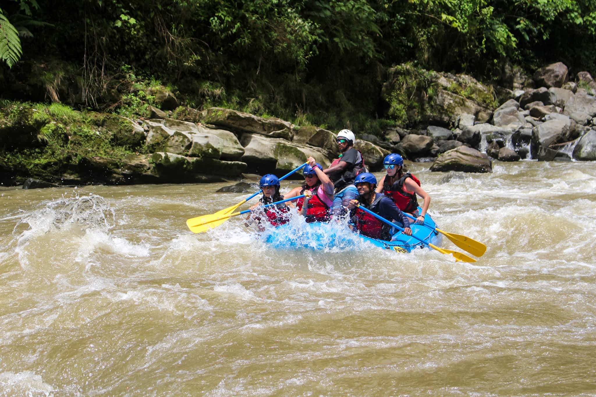 A boat of rafters on the rapids of the Pacuare River, Costa Rica.