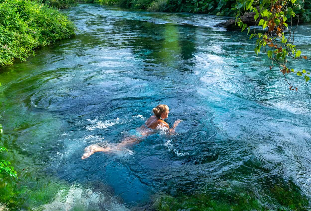 Wild Swimming in a natural pool, Albania.
