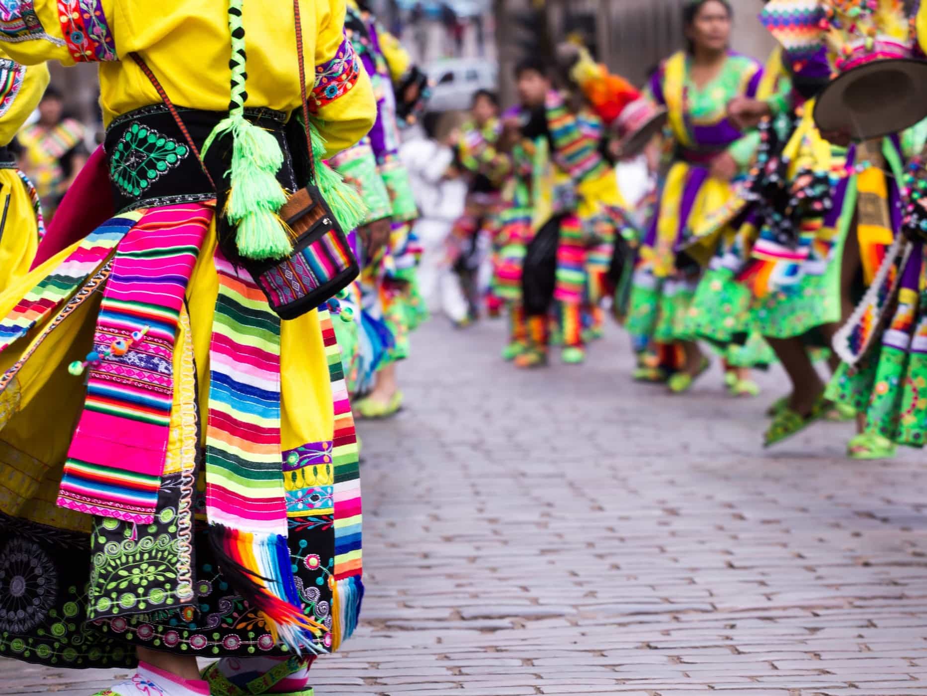 Close-up of Peruvian dancers at a parade in Cusco, Peru.