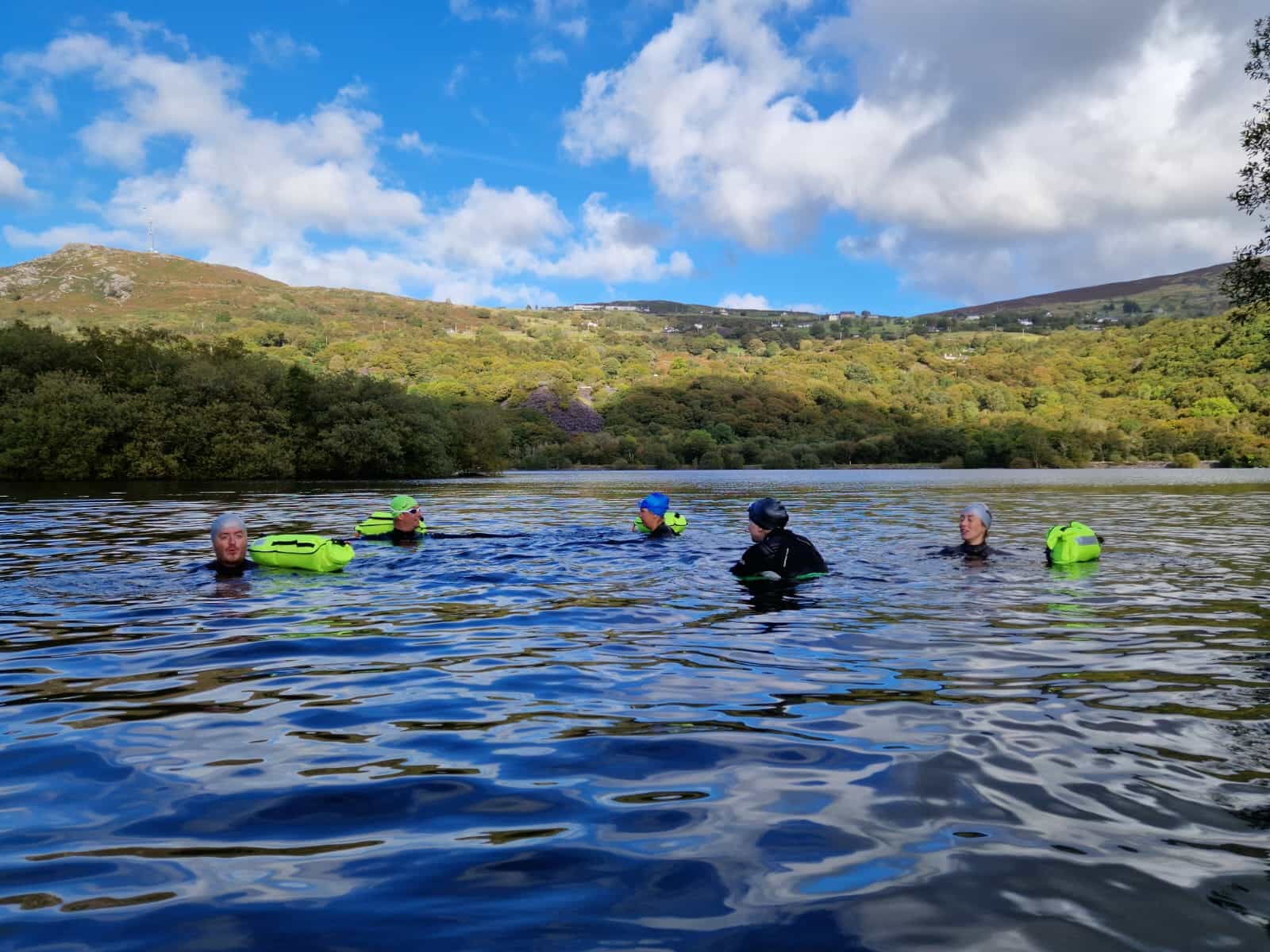 Adventurous Ewe, Snowdonia, group swimming in wetsuits