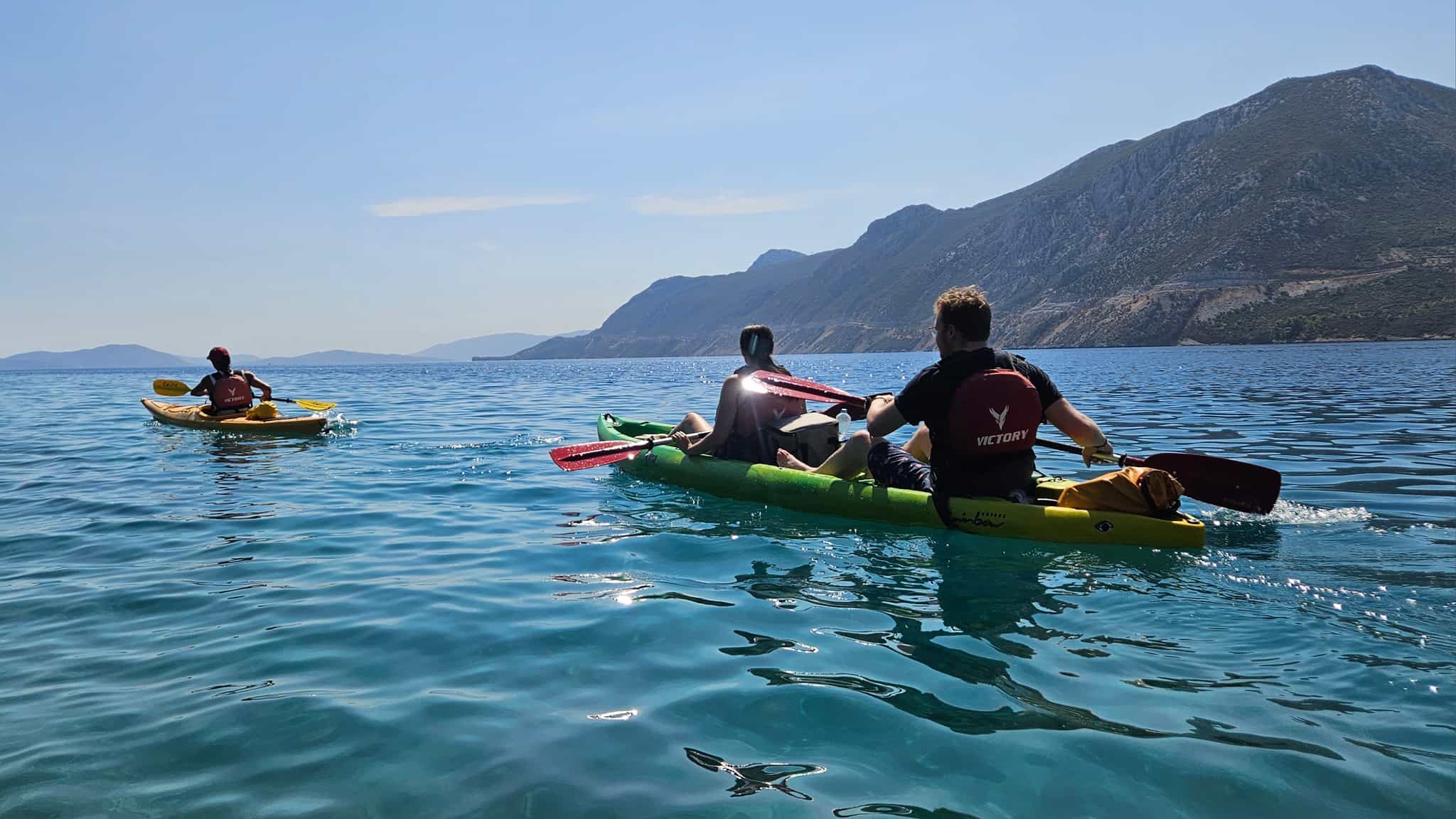 Sea kayaking over the Sunken City of Epidaurus, Peloponnese, Greece.