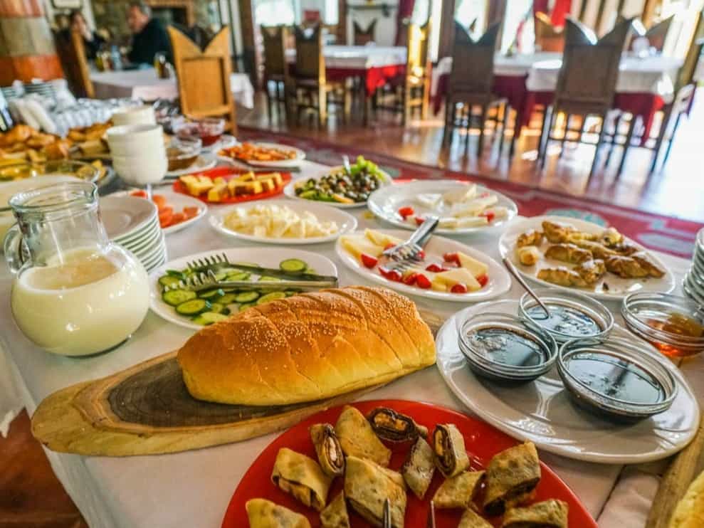 Selection of traditional Albanian dishes in a restaurant.